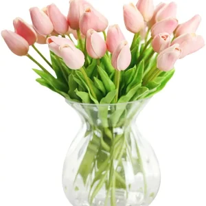 Pink tulips in clear vase