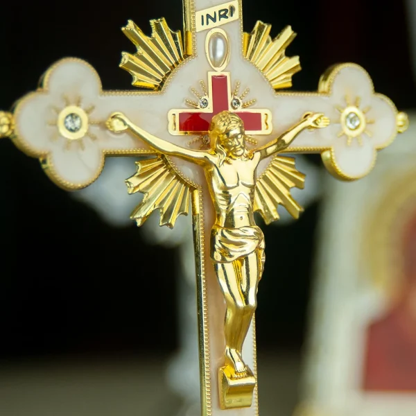 Golden crucifix with Jesus figure