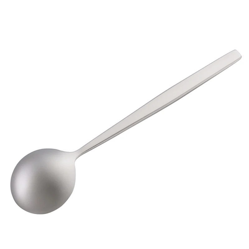 Silver stainless steel spoon on white background.