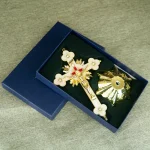 Decorative crucifix and ornament in gift box