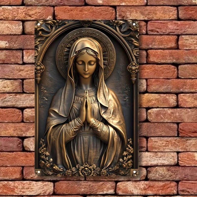 Bronze Virgin Mary relief on brick wall