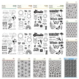 Various scrapbook stickers and patterns for crafting projects.